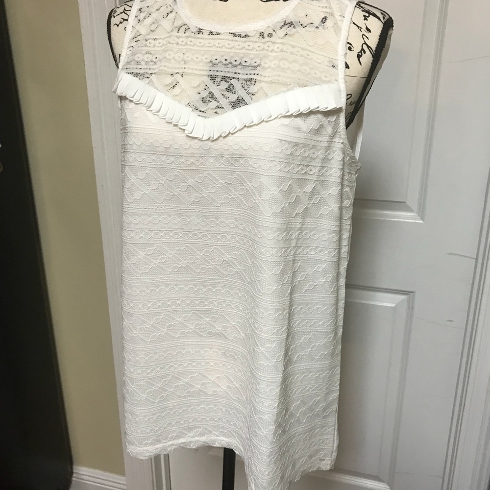 Cute top with sheer back